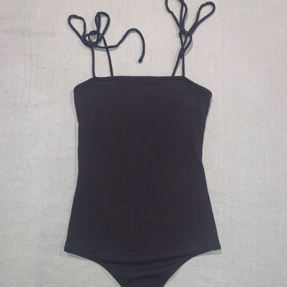 Black or white Abercrombie and Fitch bodysuits.